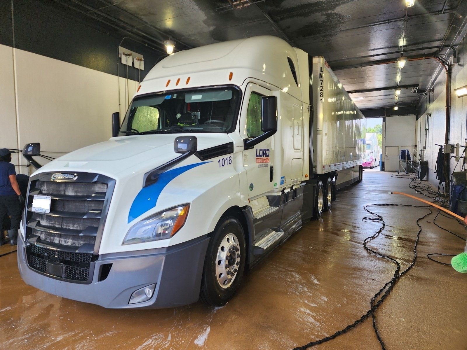 Load Monster Inc truck #1016 at wash bay